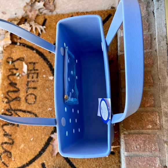 ..MAKE AN OFFER…
Baby Small Bogg Bag Tote/Carolina Light Blue. New Original tote - Picture 3 of 6